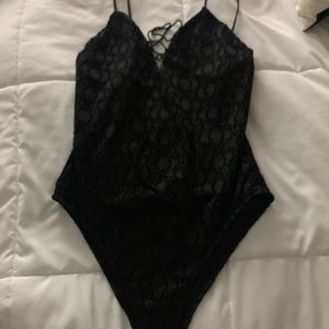 Women’s black eyelet bodysuit
